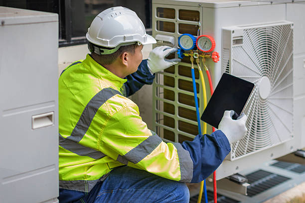 Professional Hvac technician working in Vass, NC